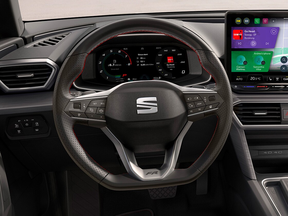 Driver seated in the seat leon with a heated steering wheel, part of the winter pack, designed to handle the coldest temperatures head-on with heated front seats and climate control.