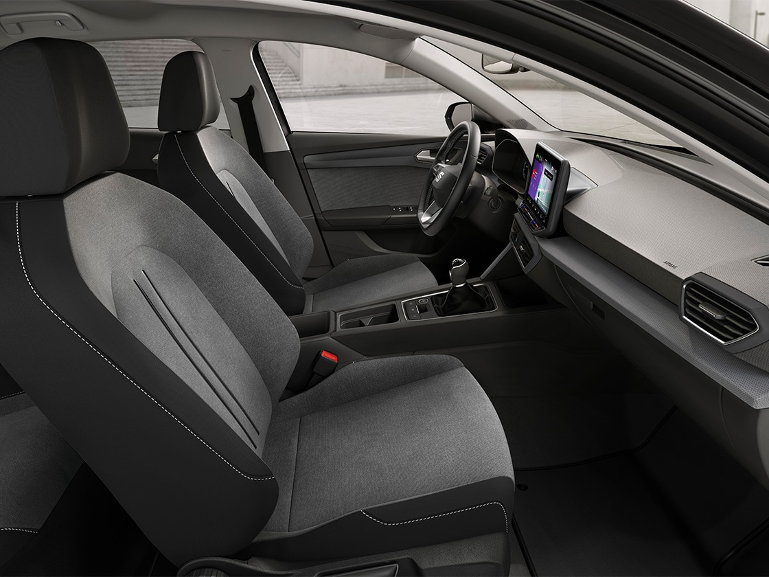 Interior view of seat leon sportstourer style featuring cloth comfort seats, offering a relaxed and practical driving. experience.
