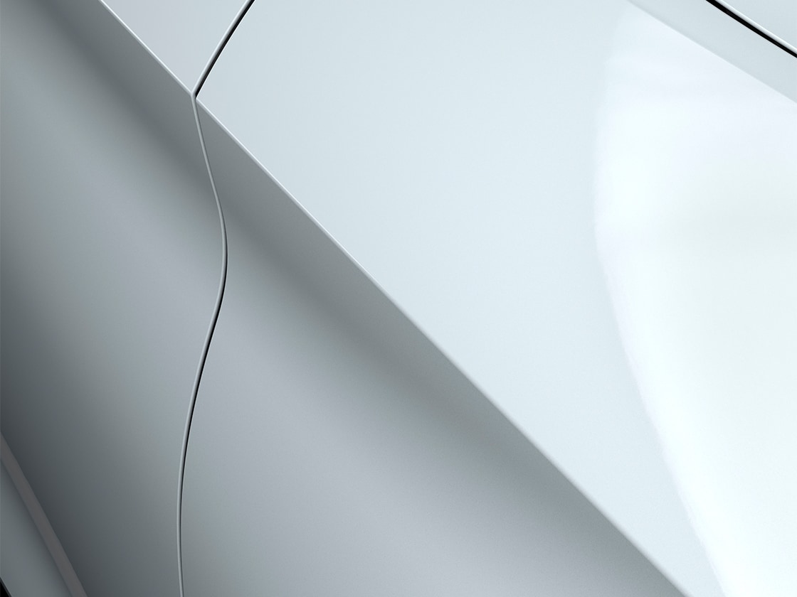 Seat leon sportstourer style in glacial white with a metallic finish, close up.