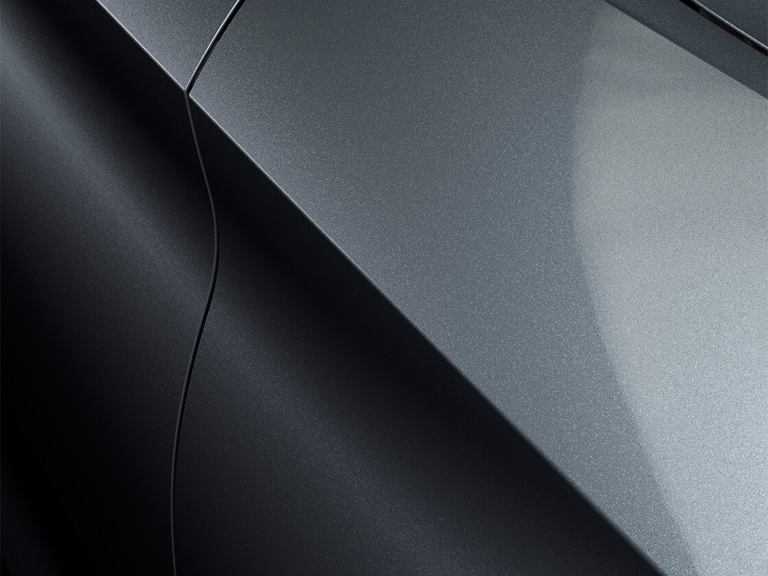 Seat leon sportstourer style in magnetic tech with a metallic finish, close up. 