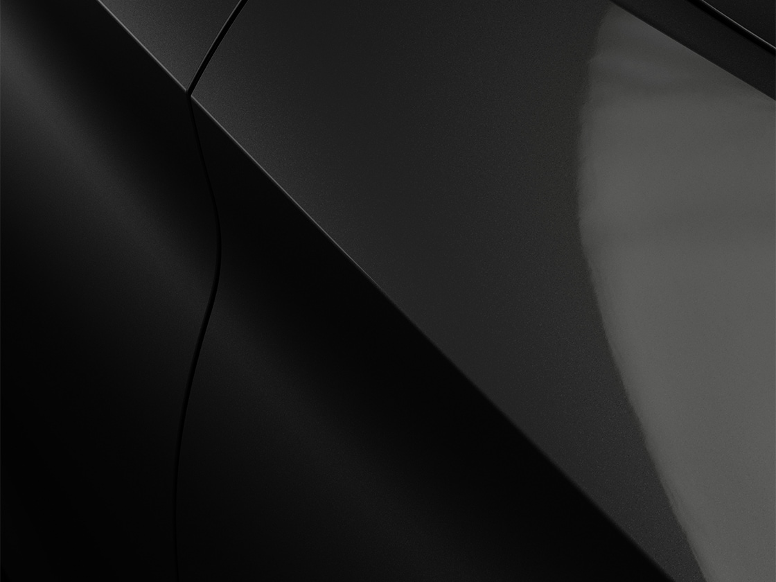 Seat leon sportstourer style in midnight black with a metallic finish, close up.