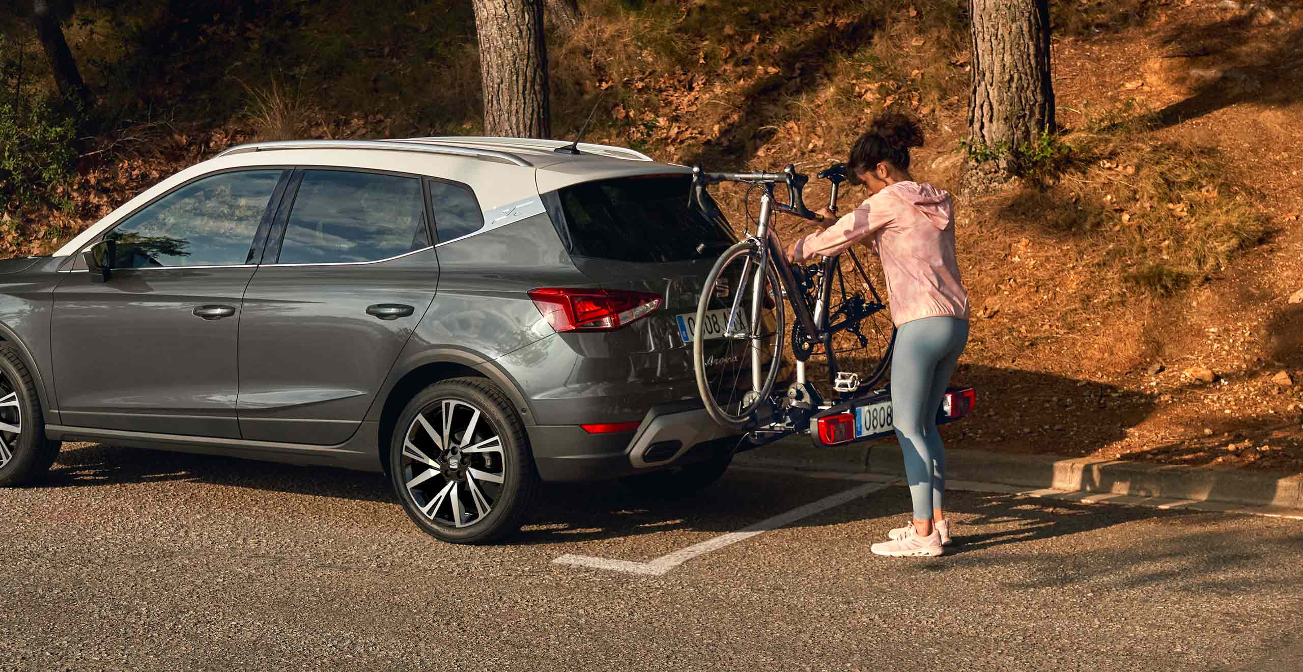 SEAT Arona dark camouflage colour with bike rack accessory