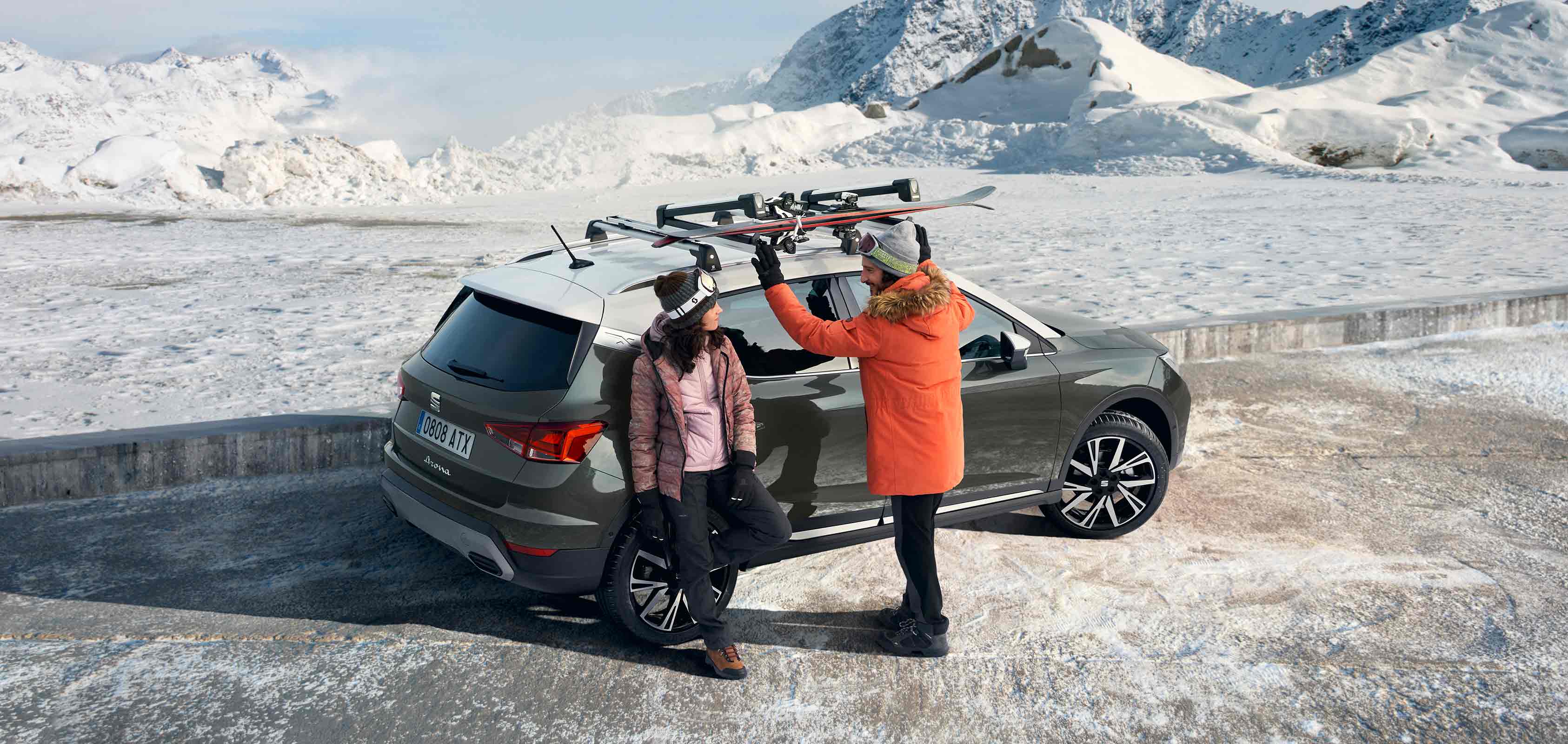 SEAT Arona dark camouflage with roof rack car